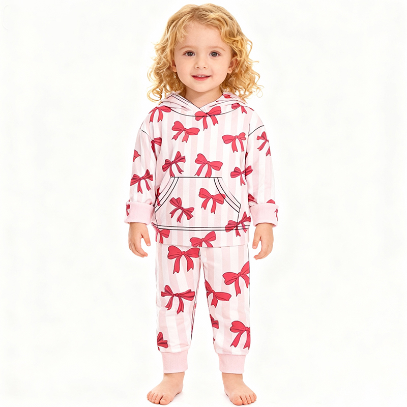Custom designer bamboo footie pajama rompers for infants and kids by Weiwei. Soft, stretchy, black smile face design. Ideal for wholesale and newborns.