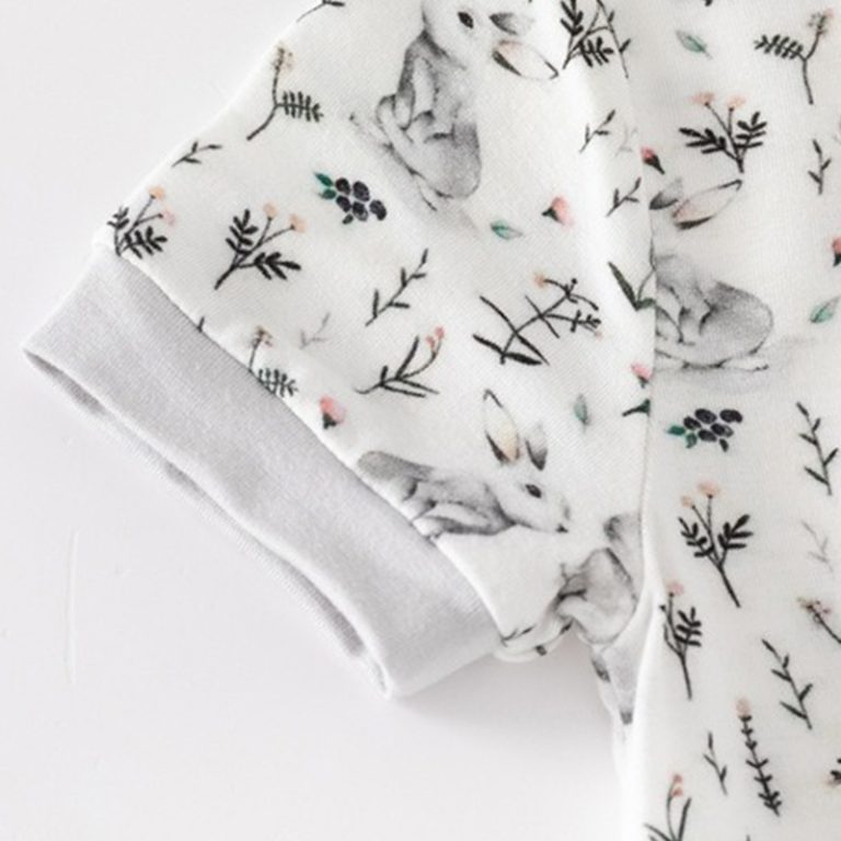 Custom wholesale baby bodysuits by Weiwei: Organic cotton and bamboo newborn rompers for boys and girls. Cozy knitted bubble sweater romper set.