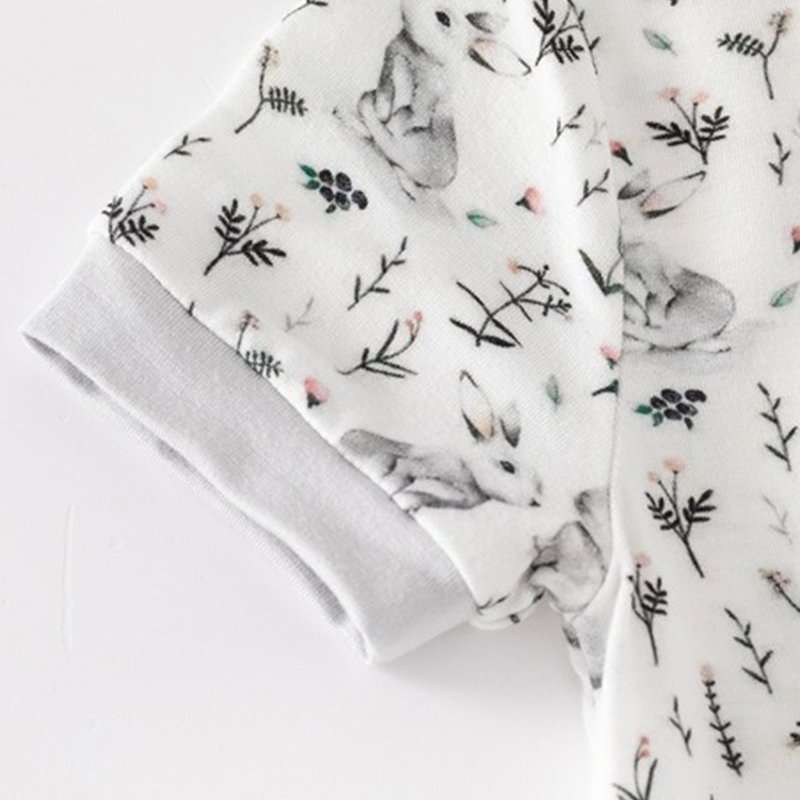 Custom wholesale baby bodysuits by WeiWei: Organic cotton and bamboo newborn rompers for boys and girls. Cozy knitted bubble sweater romper set.